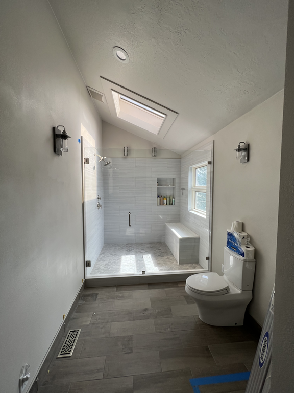 Spacious Walk-In Shower with Custom Bench